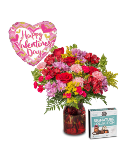 A vibrant romantic floral arrangement paired with a box of chocolates and a festive Valentine’s balloon, creating a thoughtful and celebratory gift set.