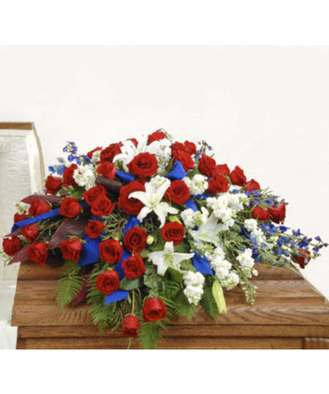 red, white, and blue patriotic casket spray