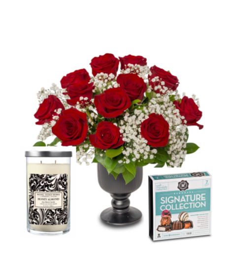 A dozen contemporary roses arranged beautifully, paired with a scented candle and a box of chocolates, creating a luxurious and romantic gift set.