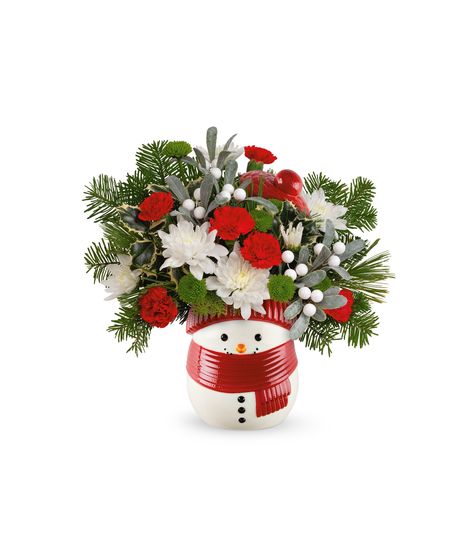 Snowman jar filled with fresh red and white flowers, winter greens, and festive accents, crafted by Walter Knoll Florist