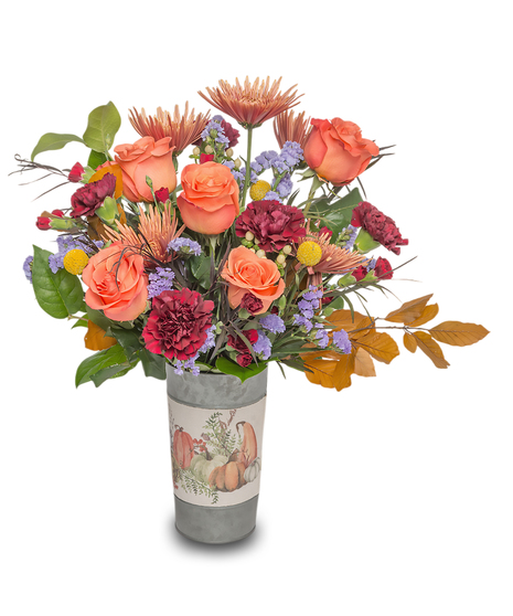 Field & Floral bouquet with vibrant orange roses, burgundy carnations, lavender statice, rustic chrysanthemums, and autumn foliage in a farmhouse-style mini bucket