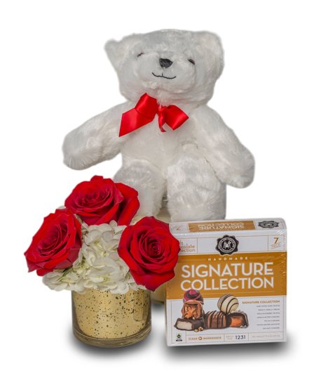 A trio of elegant roses, a small box of chocolates, and a small white bear come together in this charming and heartfelt gift set.