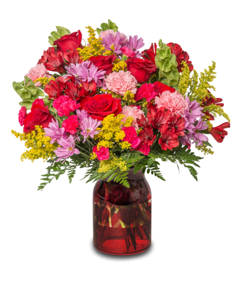 Be Mine arrangement with lavender daisies, pink carnations, red alstroemeria, red roses, Bells of Ireland, and yellow solidago. Romantic and vibrant for Valentine’s Day.