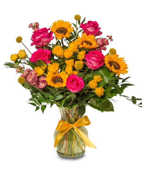 Shine For You floral arrangement with sunflowers, pink roses, spray roses, stock, billy balls in a glass vase with a yellow bow. 