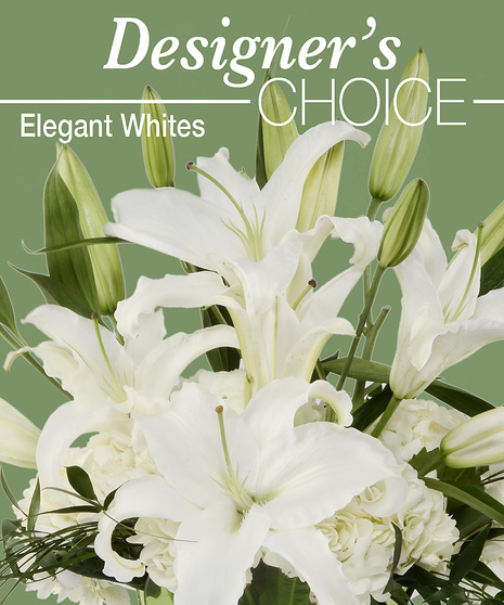 about elegant white wreath on ruscus wrapped easel from Walter Knoll  Florist, St Louis, MO