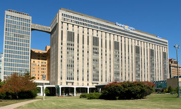 A large multi-story building labeled 